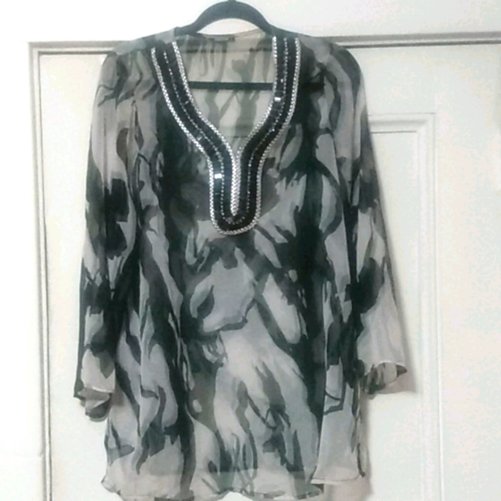 Blouse with adornments